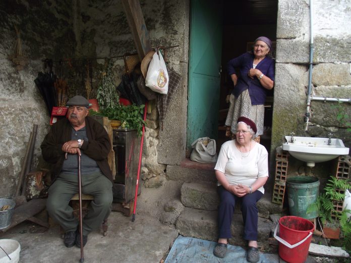 The portrait of our people The author's family in her grandparents' 19th century house; Interior of Portugal, 2018.